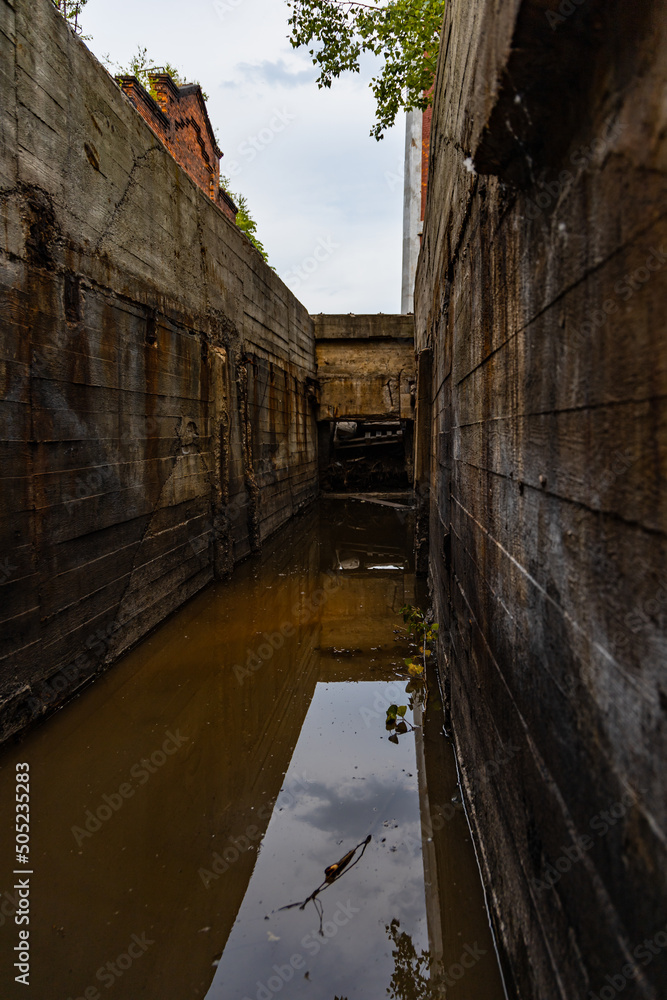 Fototapeta premium Outdoor view to square and old construction on old boiler building