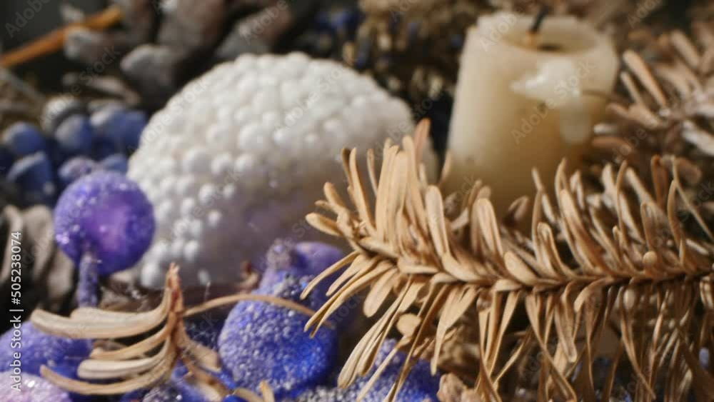 extreme close-up detailed christmas composition with candles and dried pine branches extreme close-up detailed christmas composition with candles and dried pine branches
