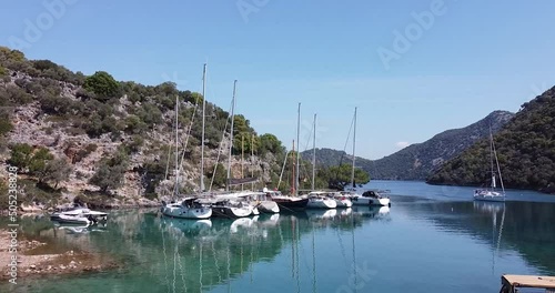 yachts on the mooring in a little bay