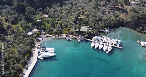 Top view of beautiful yachts in the marina filmed from the air
