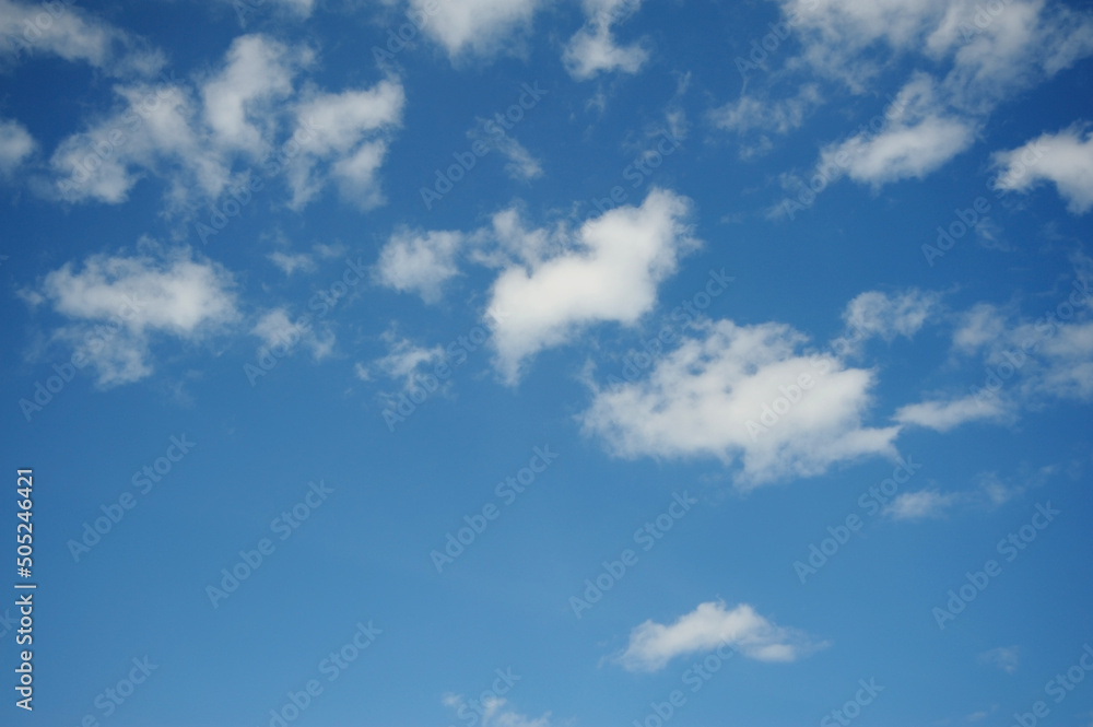 Light clouds on beautiful sky clear background