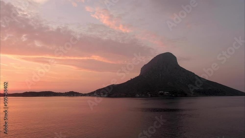 Panoramic view of Telendos island at sunset. View from Kalymnos island, Greece. photo