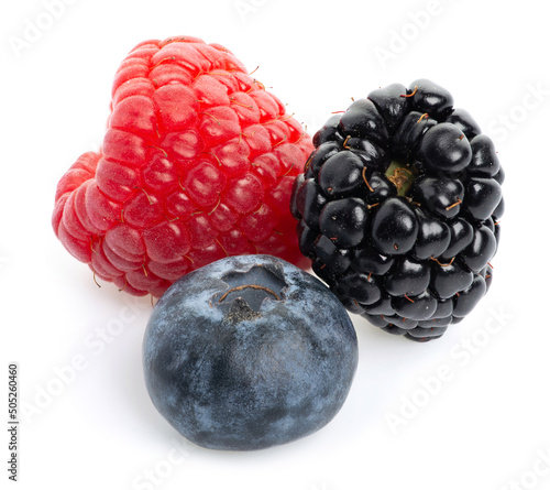 Bild auf Leinwand Macro of juicy fresh raspberry, blueberry and blackberry on isolated white backg