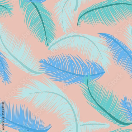 Seamless pattern with palm leaves in blue green colours. 