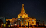 View of fanar building during the night from the souq waqif park