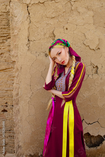 Turkmen Girl In Pink Dress photo