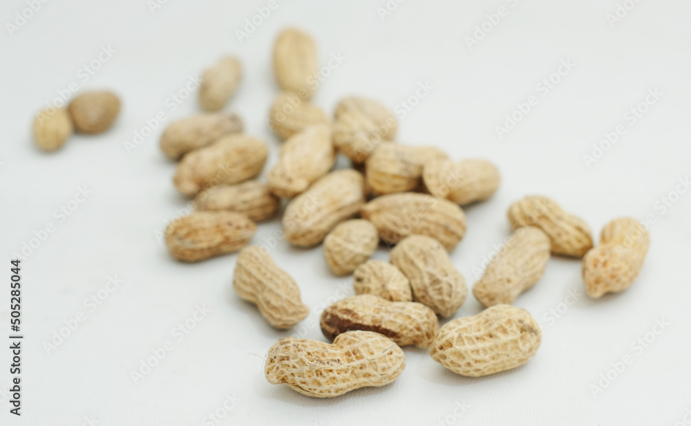 Dried peanut - Dried peanut in shell on white background. Peanut pod or arachis isolated on white background Dried peanut - Dried peanut in shell on white background. Peanut pod or arachis isolated on white background