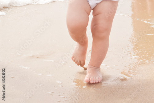 Child Walking at the Beach