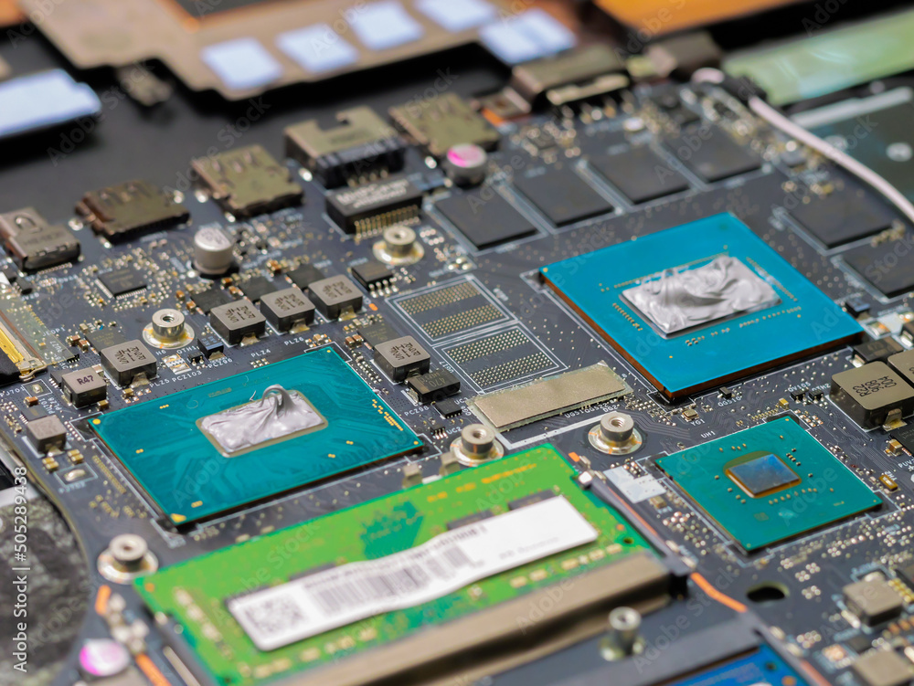 Thermal paste on the processor and graphics processor. Old thermal grease on the processor close-up. Thermal paste on the processor and graphics processor. Old thermal grease on the processor close-up.
