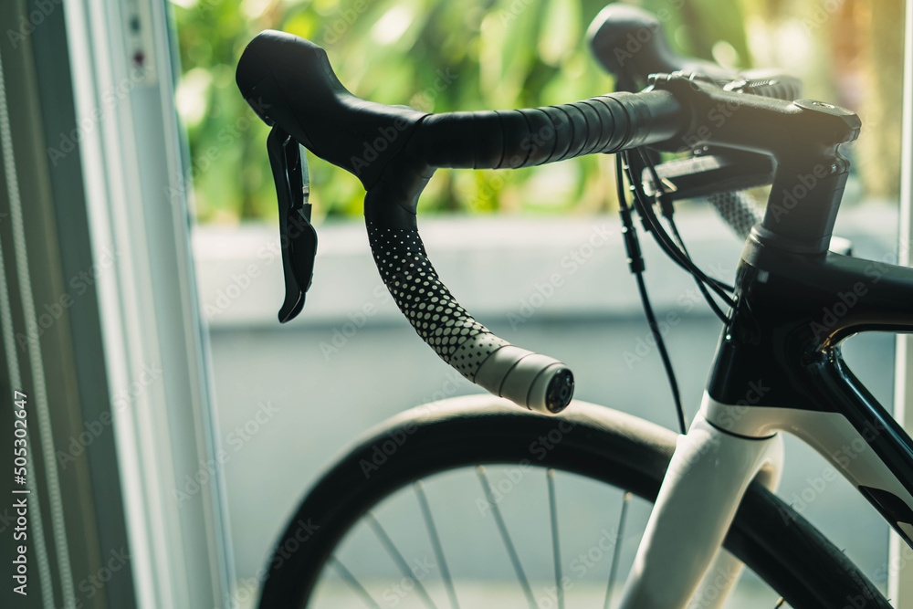 detail of road bike in private space, indoor bike training at home