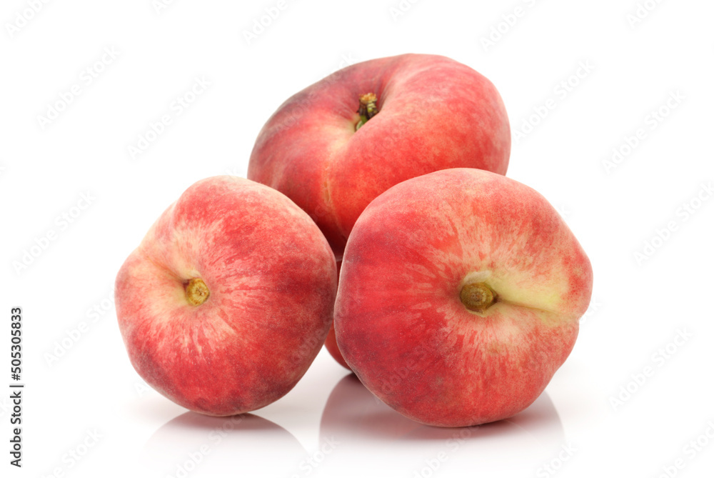 chinese flat peaches on white background