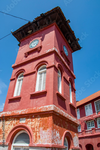 The Clocktower of Stadthuys (an old Dutch spelling, meaning city hall) is a historical structure situated in the heart of Malacca City. It is known for its red exterior. photo