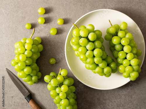 green grapes on a plate photo