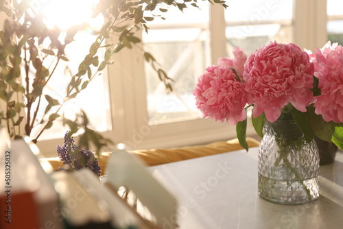 Fototapeta Naklejka Na Ścianę i Meble -  Bouquet of peonies at home in a vase