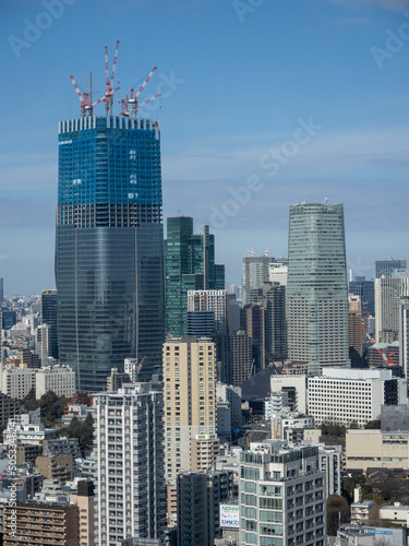 Urban landscape with high-rise under construction buildings at central Tokyo area.