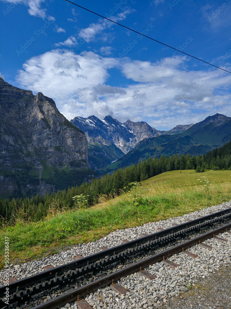 Φωτογραφία Beautiful view of the Alpine valley in the Jungfrau region against the blue sky