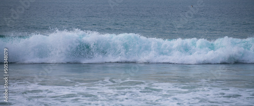 Blue ocean wave, ocean waves, natural background. Blue clean wavy sea water.
