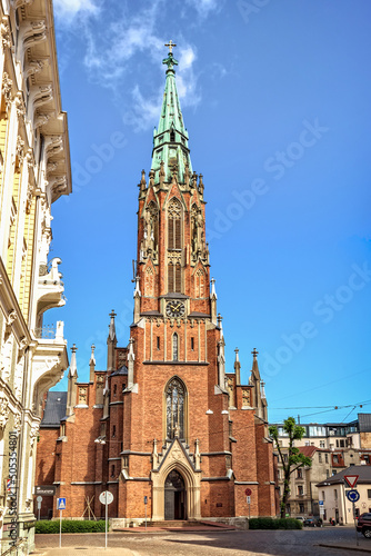 Riga, Latvia - June 26, 2015: Front view of St. Gertrude Old Church. During dramatic history since XV century church was demolished and rebuilt six times.