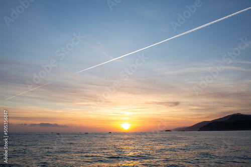 sunset over the sea photo