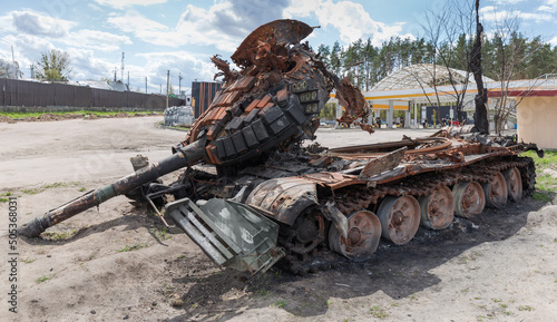 Russian tank destroyed on roadside in invasion of Ukraine, 2022 photo