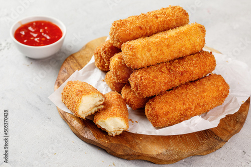 Close-up view of homemade of crusty cheese sticks