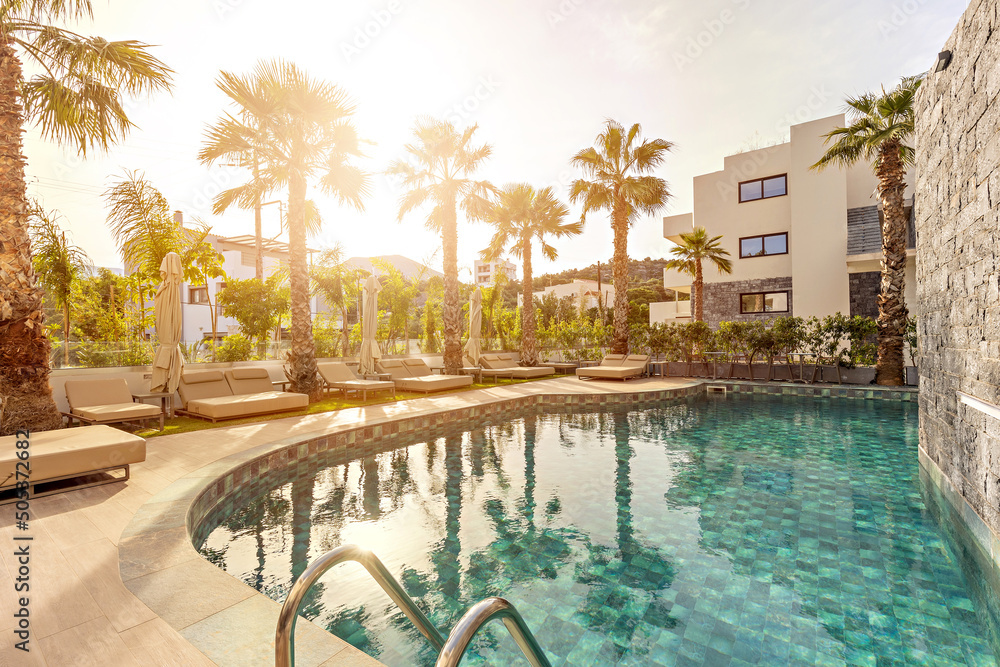 Fototapeta premium Sea hotel resort with swimming pool , morning sunlight