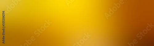 Wide abstract blurred smooth image dark yellow. Gradient background without texture pastel yellow. Blurred shine abstract texture.