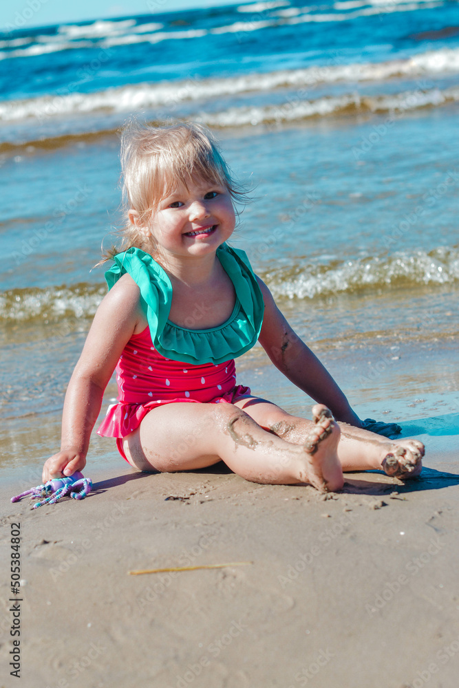 Girl of European appearance having fun on the beach Girl of European appearance having fun on the beach