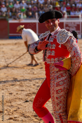 close up of a smiling bullfighter greets the public after the end of a bullfight