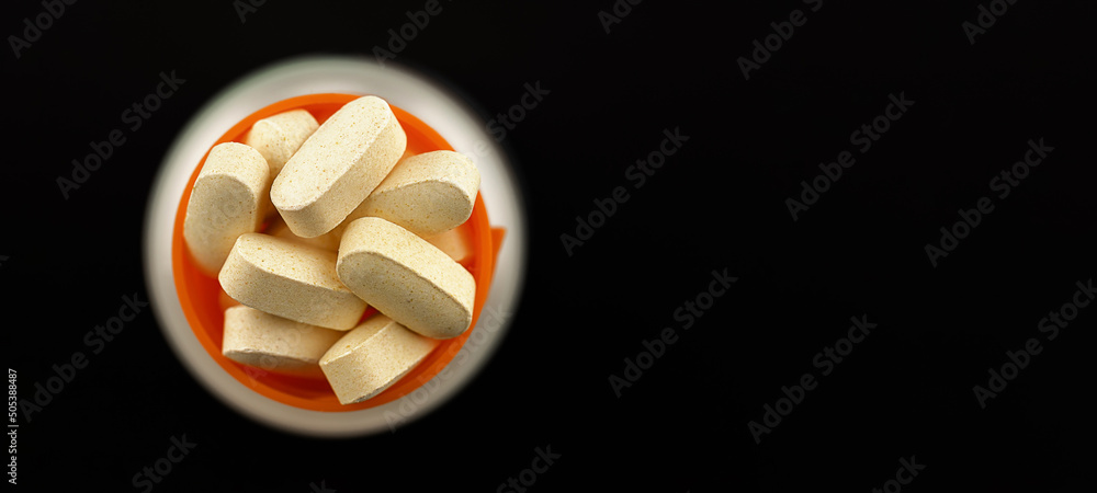 magnesium taurate pills banner. dietary concept close-up. dietary supplement topview on black background - obrazy, fototapety, plakaty 