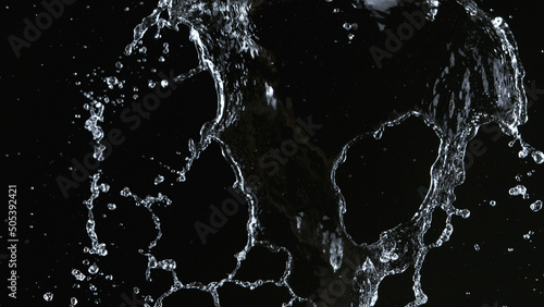 Freeze motion of water splash on black background