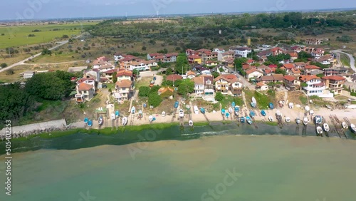 4k aerial footage in sunny day of the Cape Shabla, the easternmost point of Bulgaria, and the fishing village photo