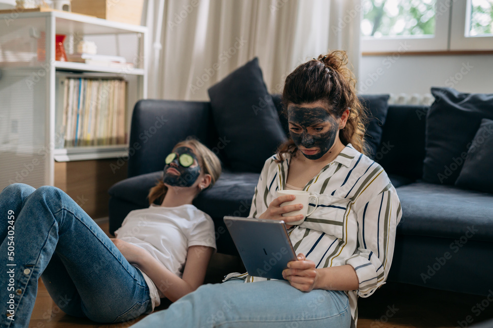mother and daughter feeling enjoyable at home. they have spa weekend at home mother and daughter feeling enjoyable at home. they have spa weekend at home
