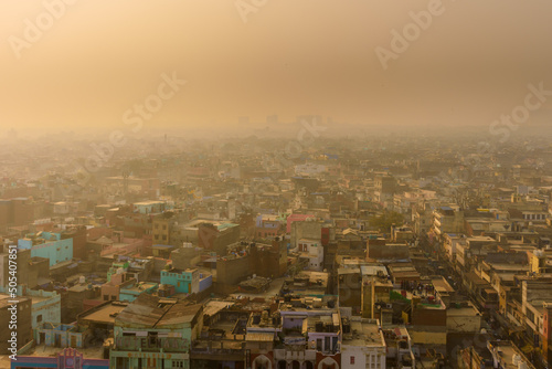 Ariel view of New Delhi with severe air pollution, dusty environment and toxic smog.