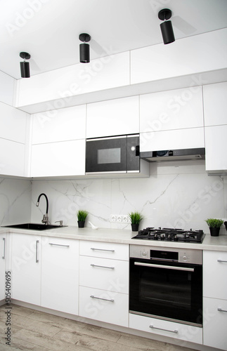 Murais de parede Modern kitchen in white and black