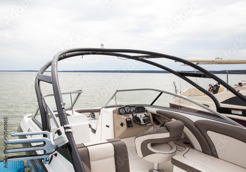 Modern pleasure yacht on the lake for tourists, speedboat photo