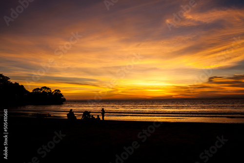 sunset with human silhouette © adelukmanulhakim