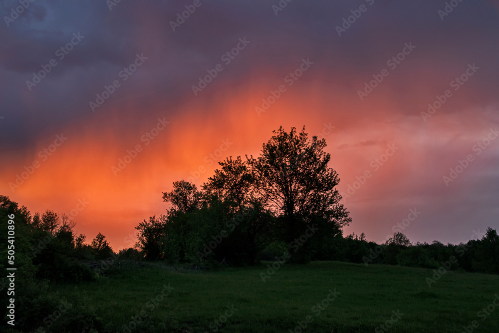 Sunset in the mountains in cloudy weather Sunset in the mountains in cloudy weather