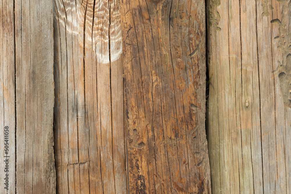 Obraz premium Background folded from shabby boards. Vertical