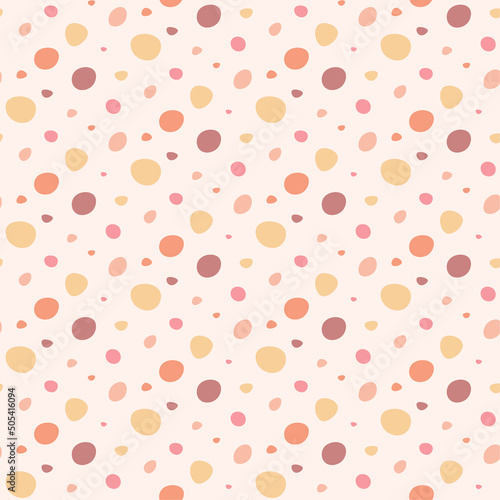 seamless pattern with colored spots in boho style on pink.