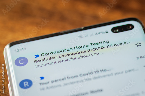 Covid 19 email notification on smartphone screen in england UK
