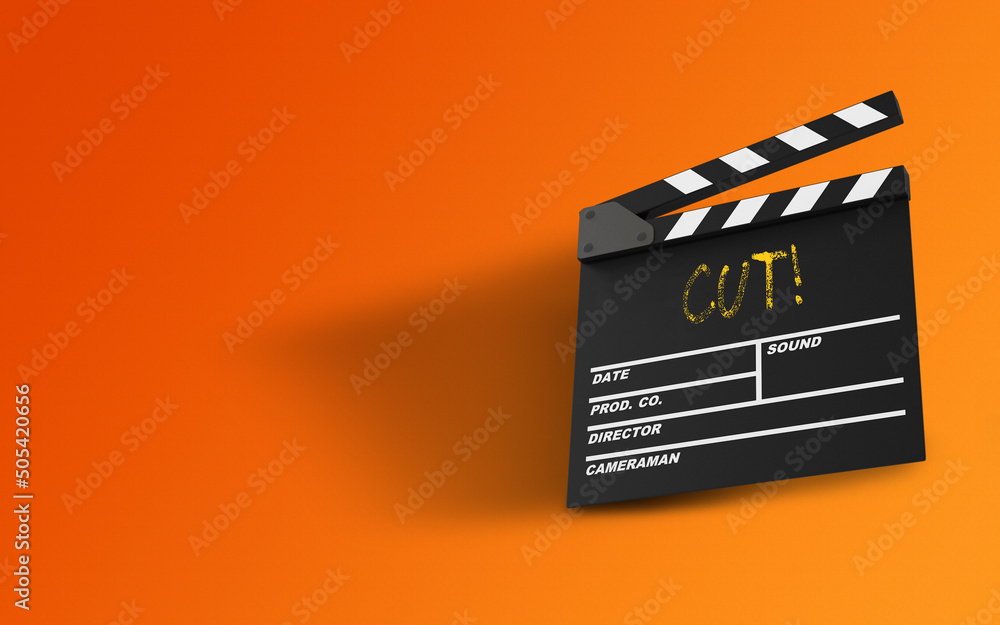 Naklejka premium Cut Message Written On A Clapperboard Against Orange