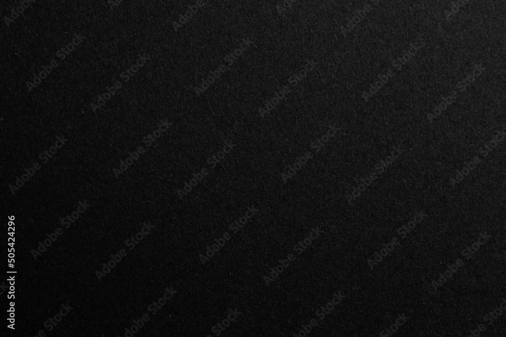 Black paper texture background, copy space for text