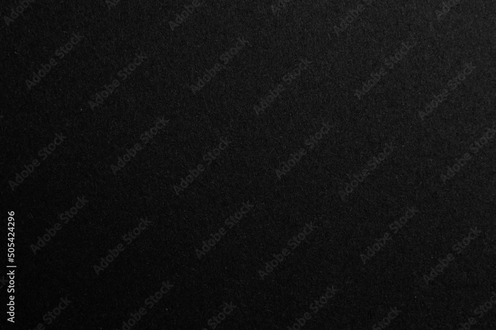 Black paper texture background, copy space for text