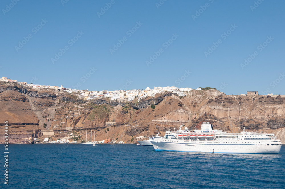 Calera cliffs of the island of Santorini as seen from the sea by cruise ships in Greece