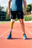 Close up disabled man athlete with leg prosthesis.