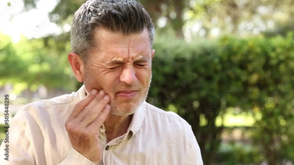 Man suffering from tooth pain. Toothache, medicine, health care concept, teeth Problem caries. Man suffering from tooth pain. Toothache, medicine, health care concept, teeth Problem caries.