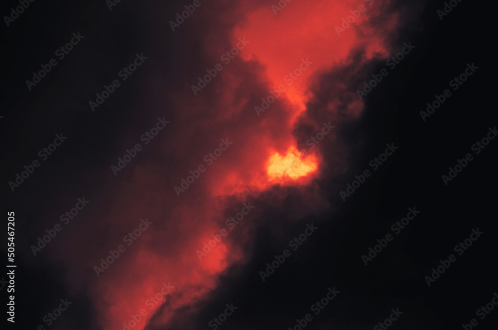 The red sky background looked like smoke and fire. bomb Violent. for wallpaper, backdrop and design.The red sky background looked like smoke and fire. bomb Violent. for wallpaper, backdrop and design.