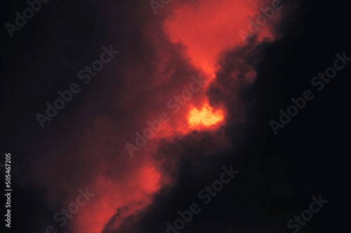 The red sky background looked like smoke and fire. bomb Violent. for wallpaper  backdrop and design.The red sky background looked like smoke and fire. bomb Violent. for wallpaper  backdrop and design.