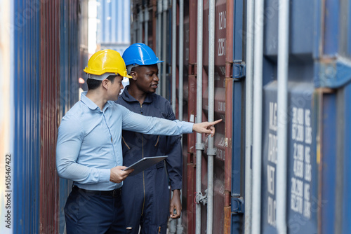 Caucasian Inspectors  Inspecting the Containers at the Port